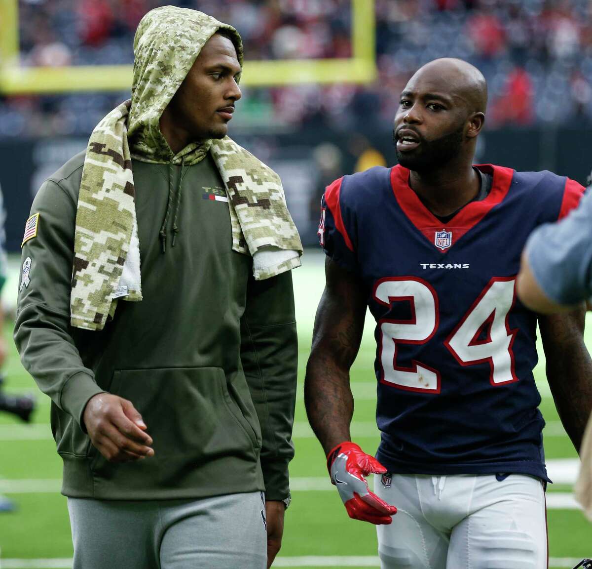 Houston Texans quarterback Deshaun Watson, left, walks off the field with cornerback Johnathan Joseph (24) after the Texans 20-14 loss to the Indianapolis Colts at NRG Stadium on Sunday, Nov. 5, 2017, in Houston.