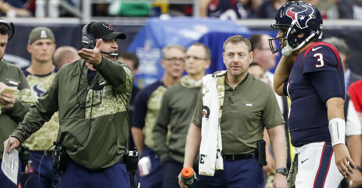 Houston Texans head coach Bill O'Brien talks to quarterback Tom Savage (3) during a time out in the third quarter of an NFL football game against the Indianapolis Colts at NRG Stadium on Sunday, Nov. 5, 2017, in Houston. ( Brett Coomer / Houston Chronicle )