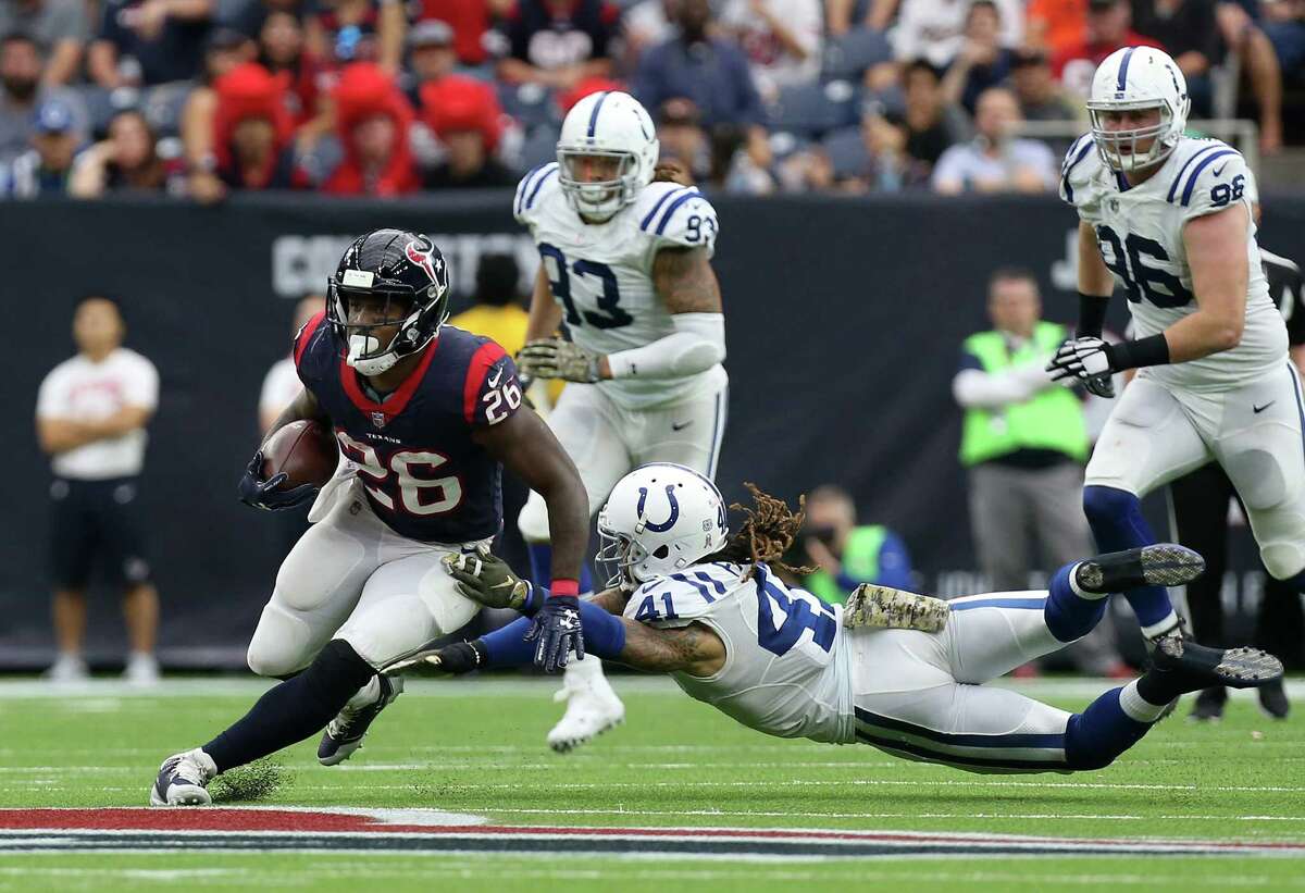 Houston Texans running back Lamar Miller (26) runs past Indianapolis Colts strong safety Matthias Farley (41) during the second half of the game at NRG Stadium Sunday, Nov. 5, 2017, in Houston. The Colts won 20-14.
