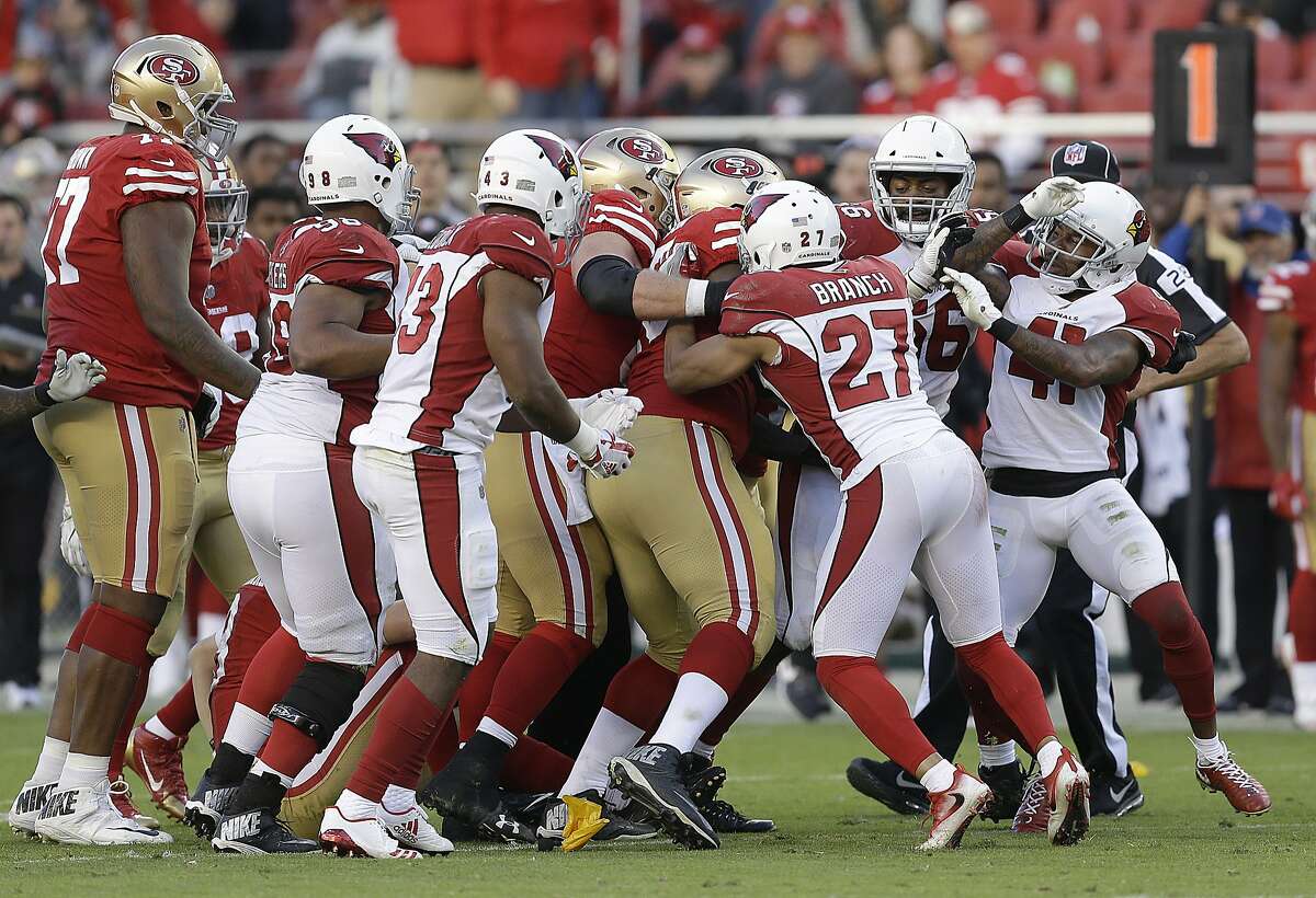 Arizona Cardinals strong safety Antoine Bethea, right, and teammates confront San Francisco 49ers players during the second half of an NFL football game in Santa Clara, Calif., Sunday, Nov. 5, 2017. (AP Photo/Ben Margot)