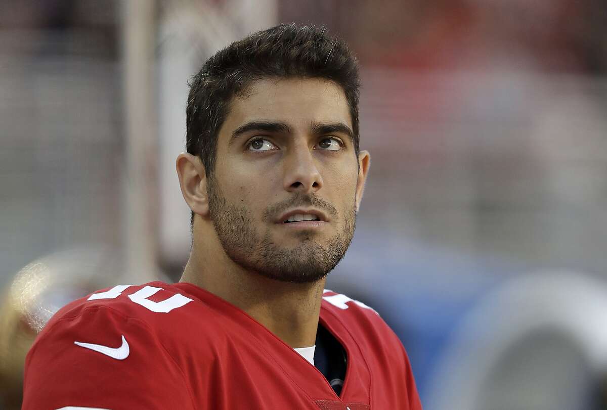 San Francisco 49ers quarterback Jimmy Garoppolo (10) stands on the sideline during the second half of an NFL football game against the Arizona Cardinals in Santa Clara, Calif., Sunday, Nov. 5, 2017. (AP Photo/Marcio Jose Sanchez)