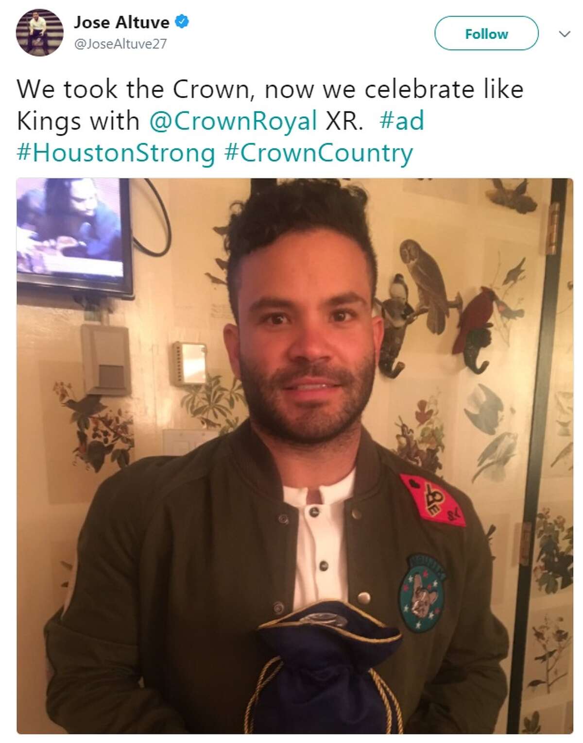 Jose Altuve shares his affection for Crown Royal whiskey with fellow Astros