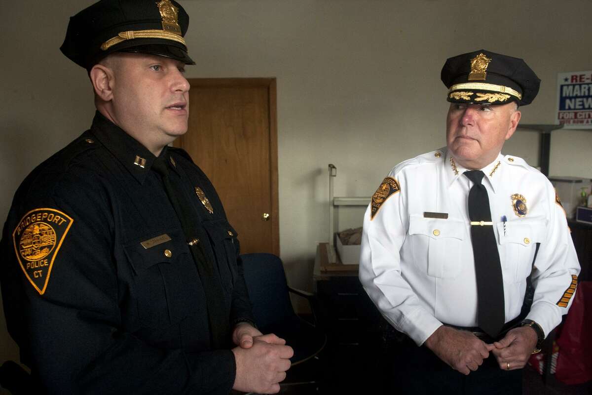 Police Captain Mark Straubel, left, and Chief Armando ?“A.J.?” speak at the site of an new police substation that will soon open in Bridgeport, Conn. Nov. 6, 2017.