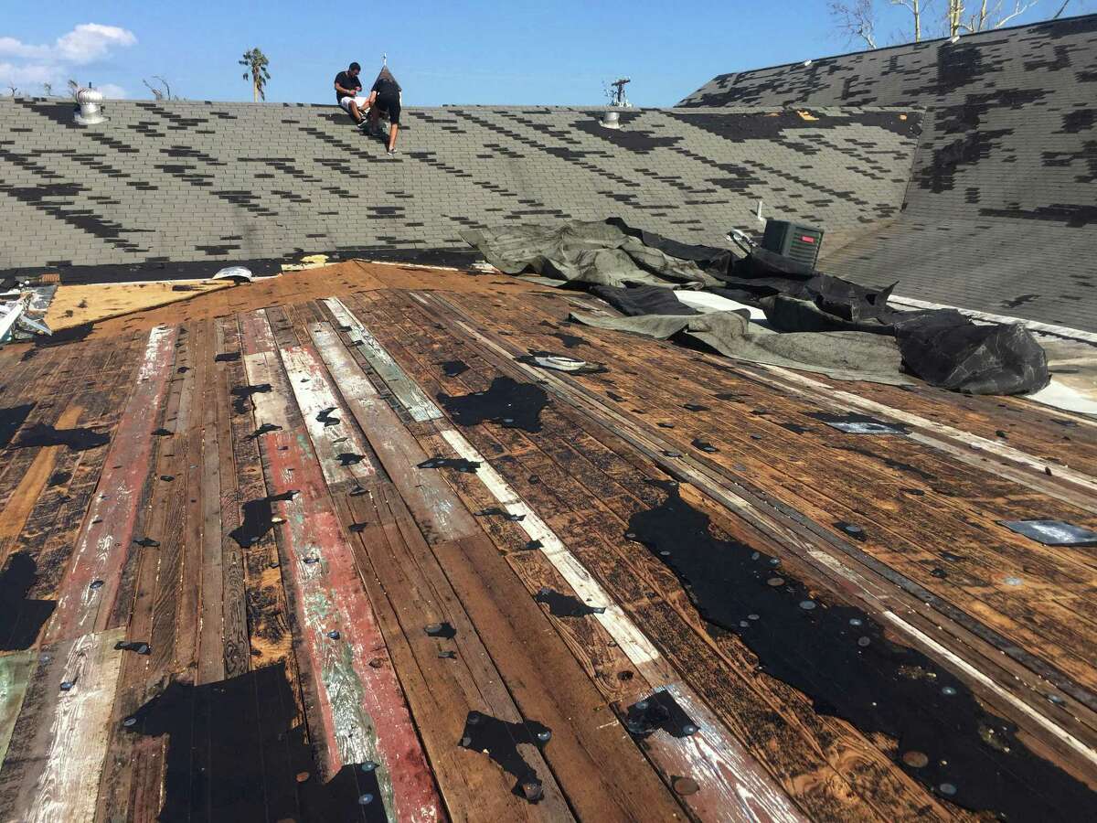 Volunteers inspect damage to the roof of Rockport First Assembly of God Church in Rockport on Aug. 30. The church, which was hit by Hurricane Harvey, has filed a lawsuit against the Federal Emergency Management Agency, challenging its policy of denying disaster aid to repair or rebuild places of worship. Places of worship are routinely denied FEMA aid when it comes time to repair and rebuild their damaged sanctuaries.