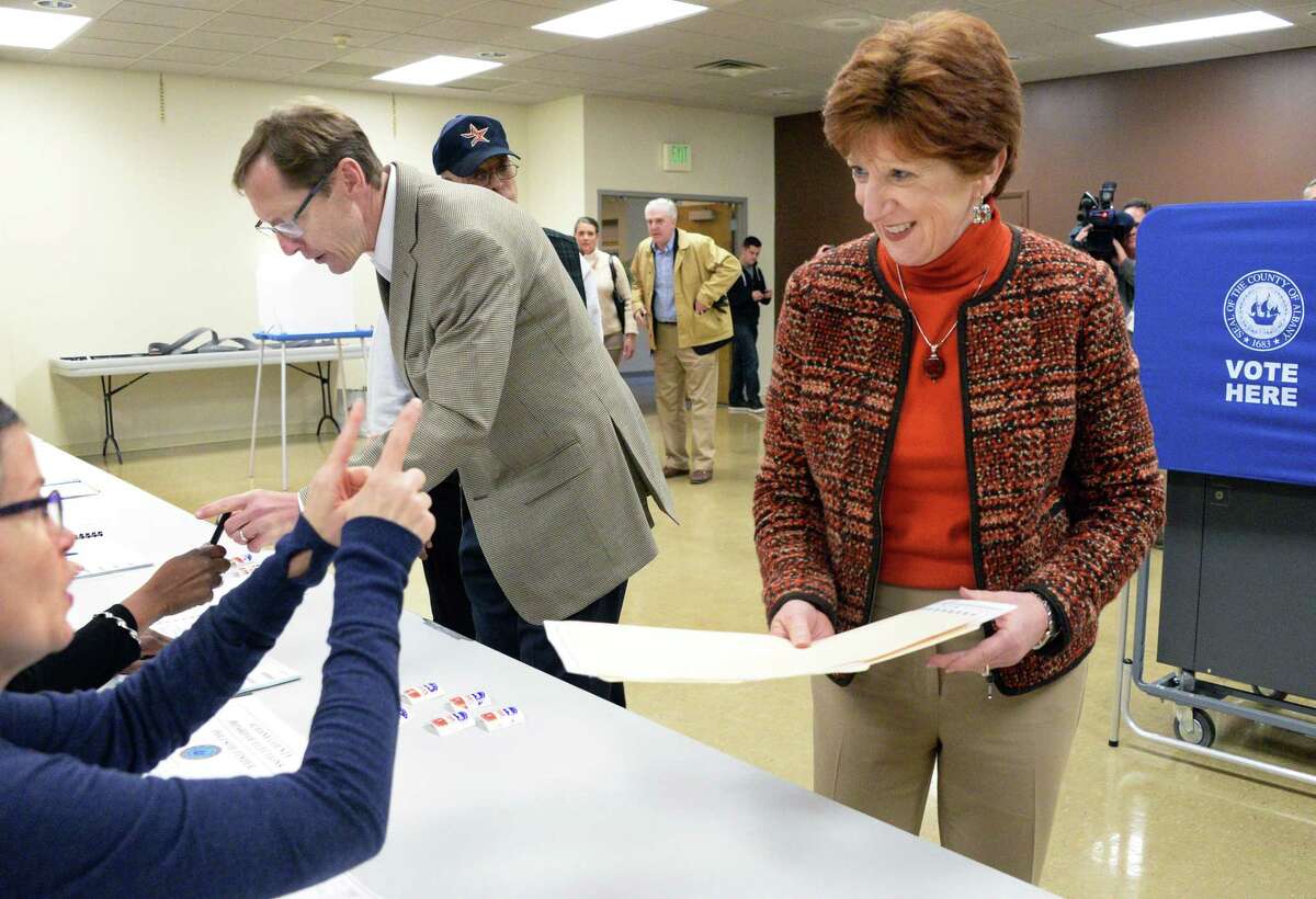 Mayor Kathy Sheehan and husband Robert get their ballots at B'Nai Shalom Tuesday Nov. 7, 2017 in Albany, NY. (John Carl D'Annibale / Times Union)