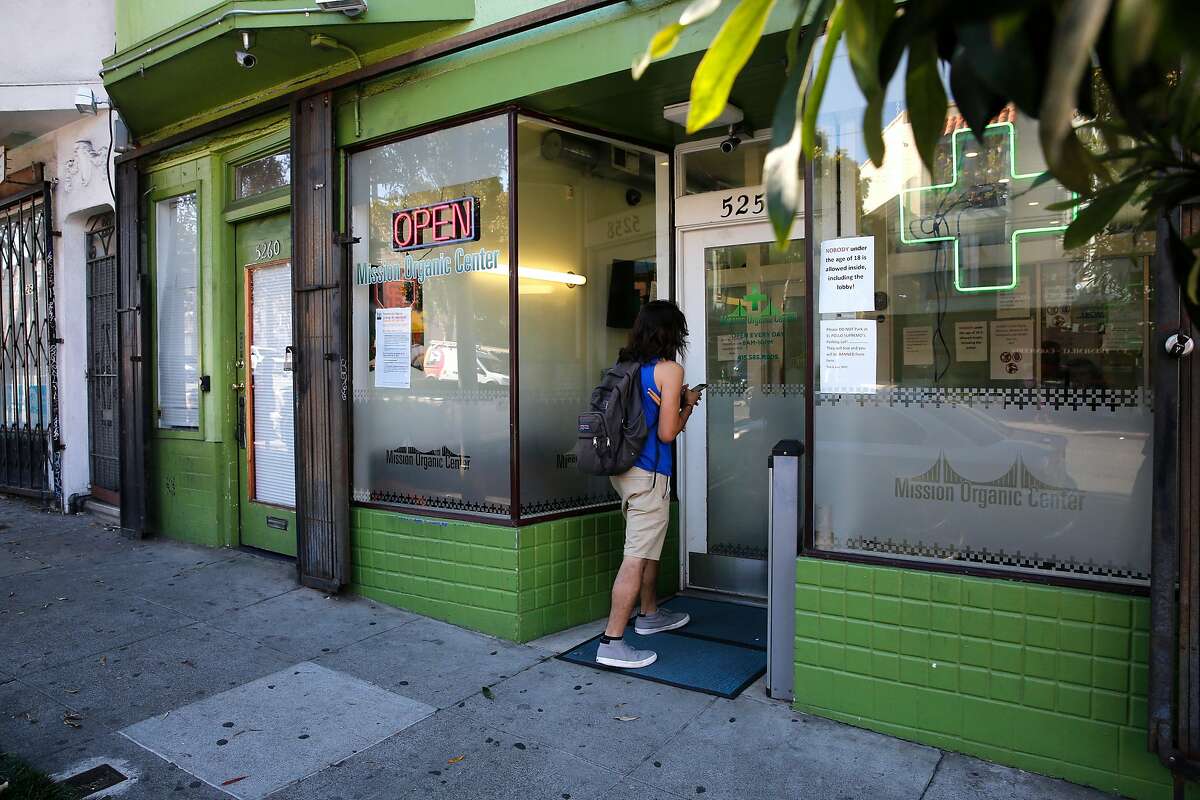 Mission Organic Center, a cannabis store is a few doors down from the El Pollo Supremo restaurant along Mission St. near Geneva in San Francisco, Ca. as seen on Thurs. Sept. 28, 2017.