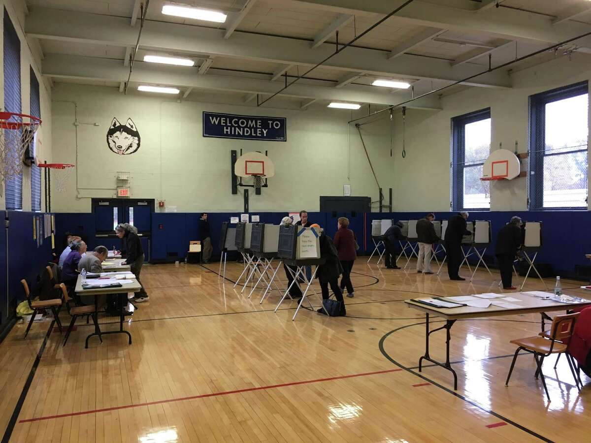 Voting takes place at Hindley Elementary School in Darien in this file photo.