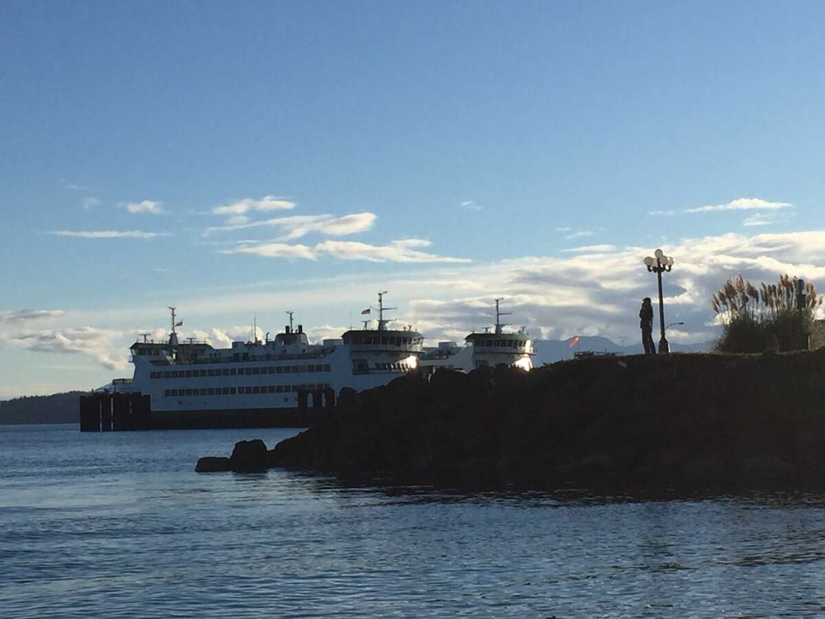 Port Townsend's ferry to Whidbey Island is seen on a summer evening.