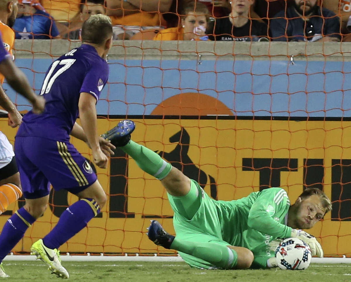 Goalkeeper Joe Willis, right, came up with two key saves in relief of suspended starter Tyler Deric in the Dynamo's postseason upset of the Portland Timbers.