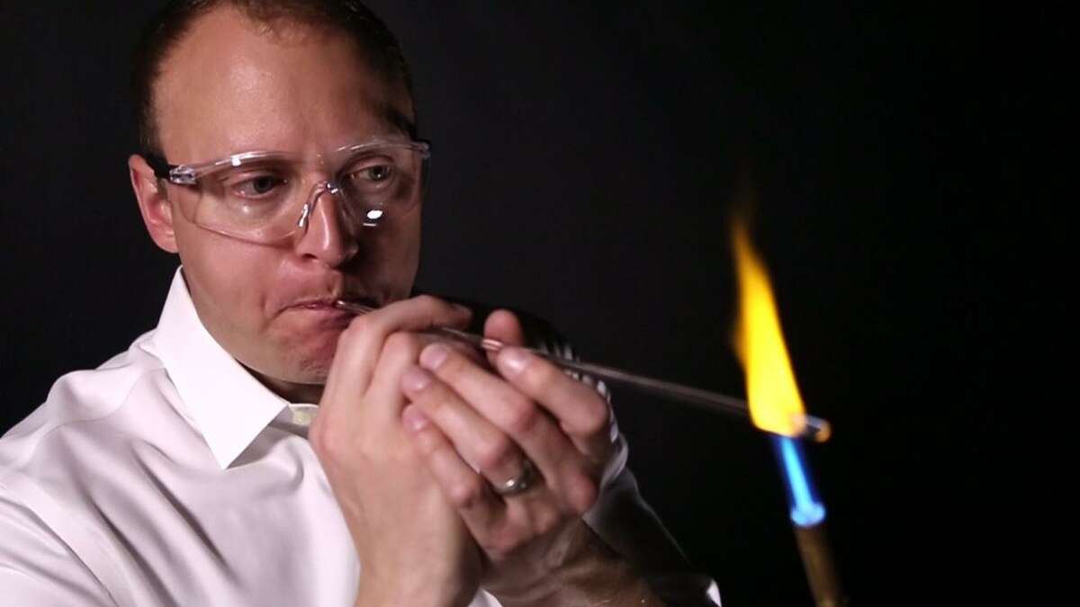 Adam Caskey channels his inner nerd and was a bit hit at the American Meteorological Societys 44th Conference on Broadcast Meteorology in Austin, where, in a lab coat and safety glasses, he wielded a blow torch and showed how he crafts his popular thermometers.