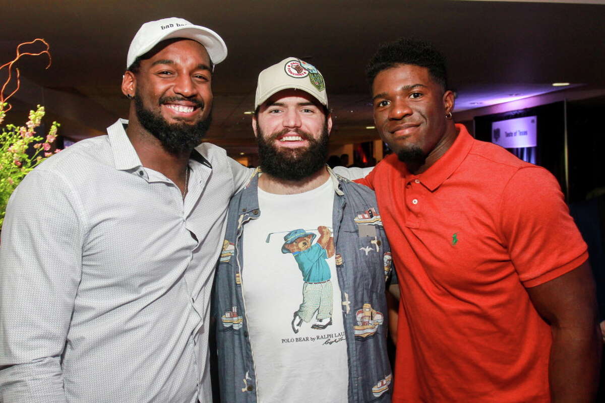 Houston Texans Zach Cunningham, from left, Ben Heeney and Kennan Gilchrist at the Taste of the Texans.