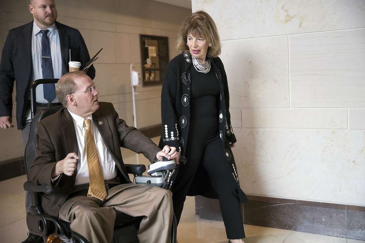 Rep. Jackie Speier, D-Calif., center, speaks with Rep. Jim Langevin, D-R.I., left, as they leave a Democratic gathering on Capitol Hill in Washington, Friday, Nov. 3, 2017. Speier has recently gone public with an account of being sexually assaulted by a male chief of staff while she was a congressional staffer. She has criticized the vague rules in place on the issue and is preparing legislation to mandate sexual harassment training for congressional offices, among other changes. (AP Photo/J. Scott Applewhite)