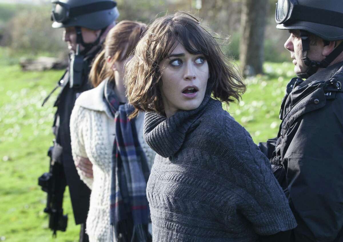 The wild accomplice: Lizzy Caplan is excellent as the oncologist who's also an alcoholic, substance abuser and sex addict, who helps two friends kidnap and forcibly inject chemo into their dear sick pal in "Ill Behaviour" on Showtime.