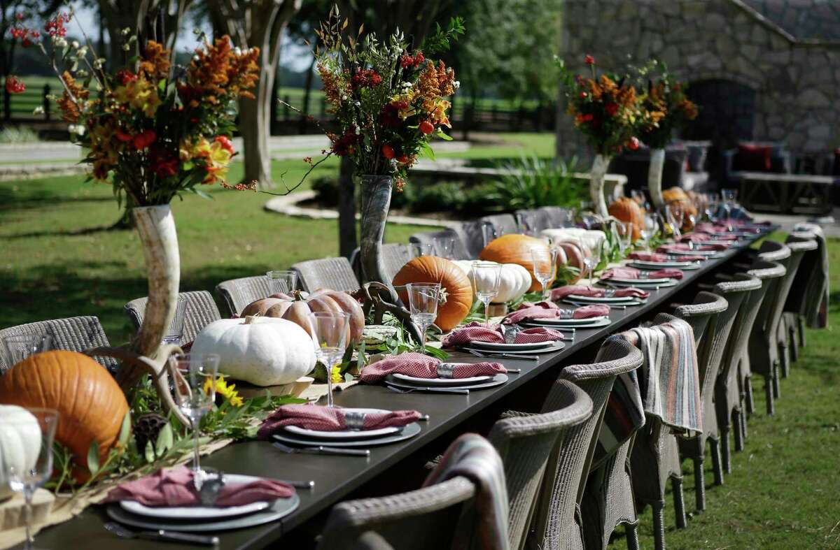 A dining table set for Thanksgiving shown at the country home of Brad and Stephanie Tucker Monday, Oct. 9, 2017, in Waller. ( Melissa Phillip / Houston Chronicle )