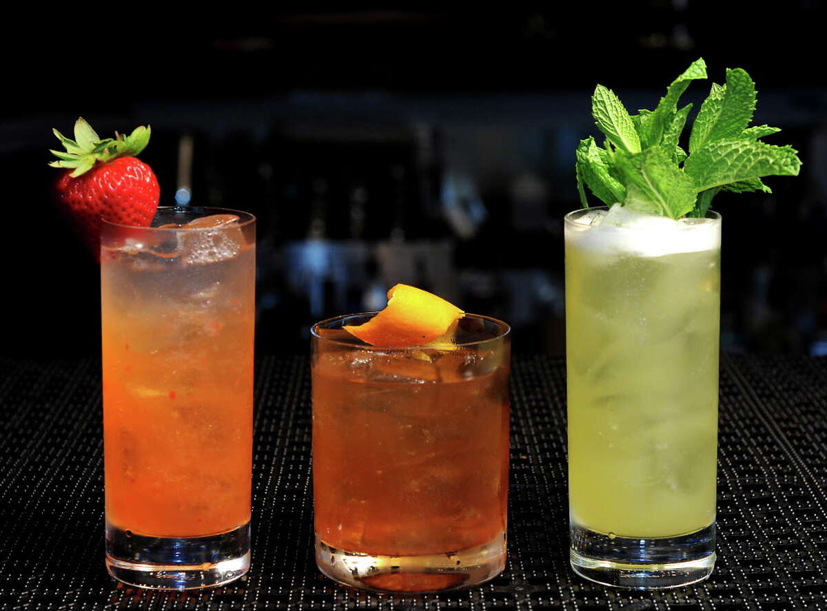 Left to right: Strawberry Rhubarb Cooler, Old Fashioned Brandy and Elixir 48 at the new Steak 48 restaurant in the River Oaks district.