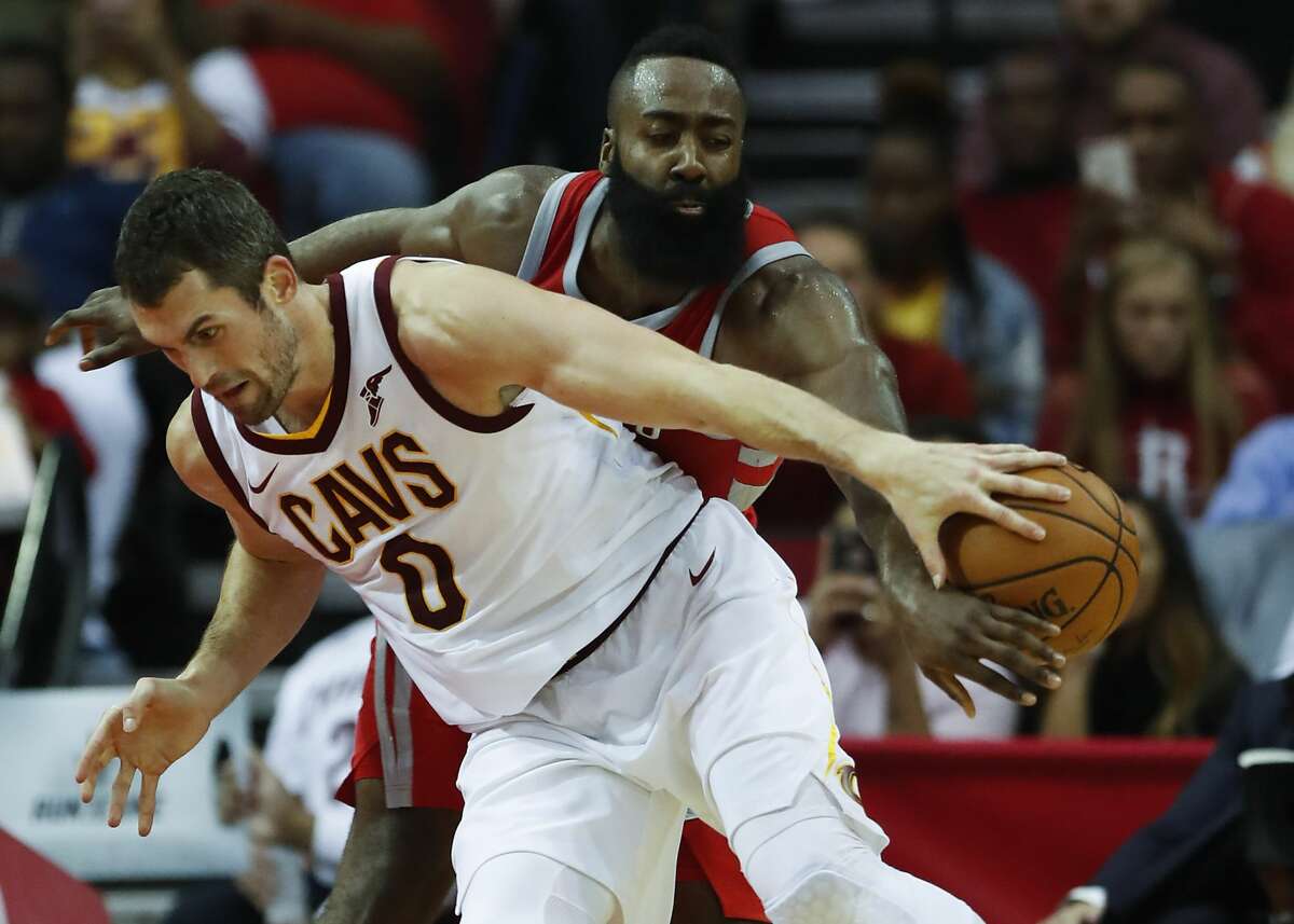 Houston Rockets guard James Harden (13) steals the ball away from Cleveland Cavaliers forward Kevin Love (0) during the first half of an NBA basketball game at Toyota Center on Thursday, Nov. 9, 2017, in Houston. ( Brett Coomer / Houston Chronicle )