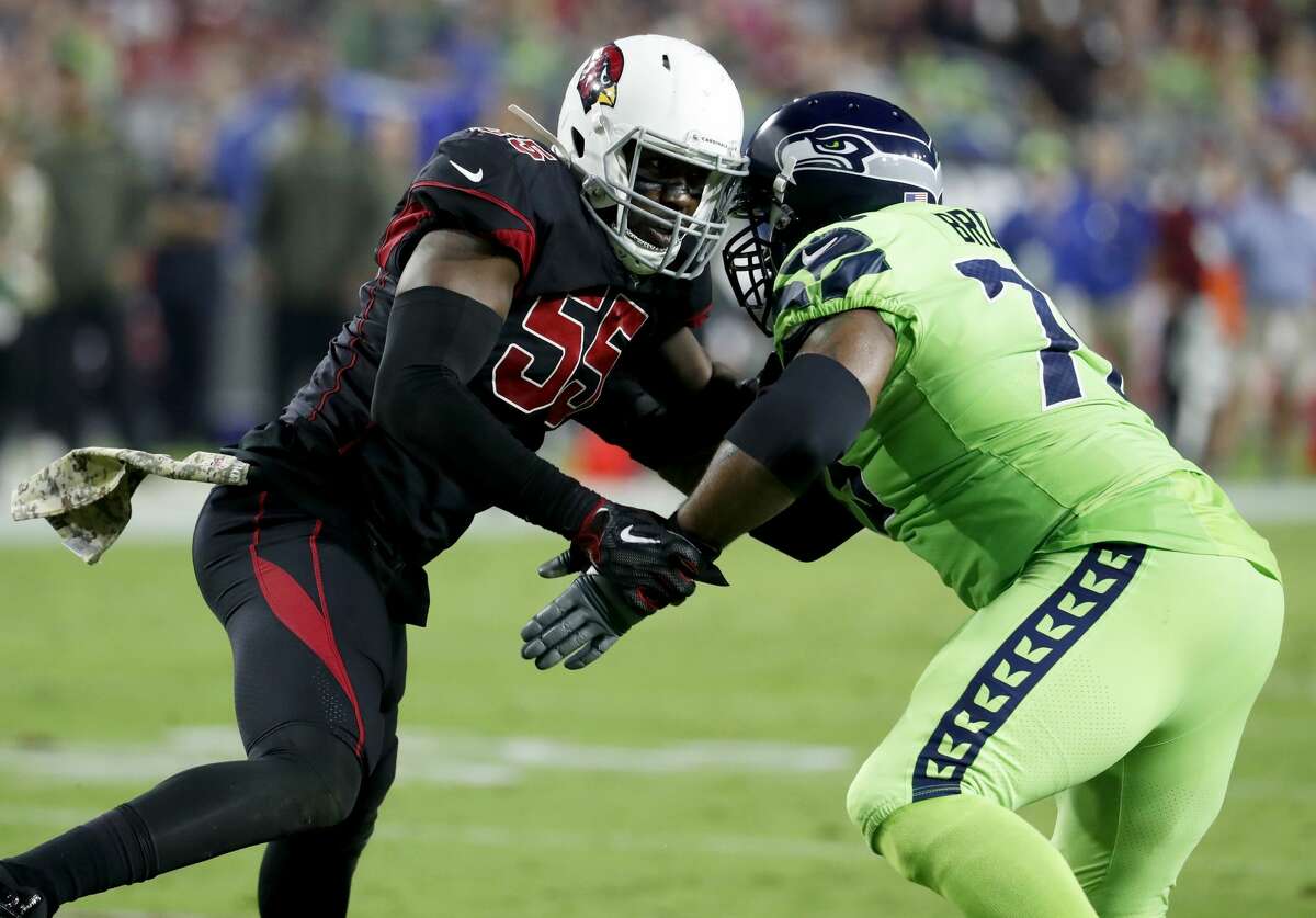 Arizona Cardinals outside linebacker Chandler Jones (55) and Seattle Seahawks offensive tackle Duane Brown battle during the first half of an NFL football game, Thursday, Nov. 9, 2017, in Glendale, Arizona.