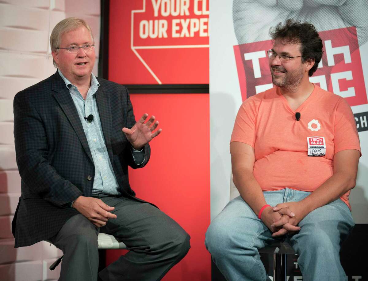 Graham Weston, left, and Dirk Elmendorf take part in a panel discussion during the annual Tech Bloc rally, Thursday, Nov. 9, 2017, at Rackspace in San Antonio. Elmendorf was an early supporter of Mayor Ron Nirenberg and serves of his campaign finance committee. (Darren Abate/For the San Antonio Express-News)
