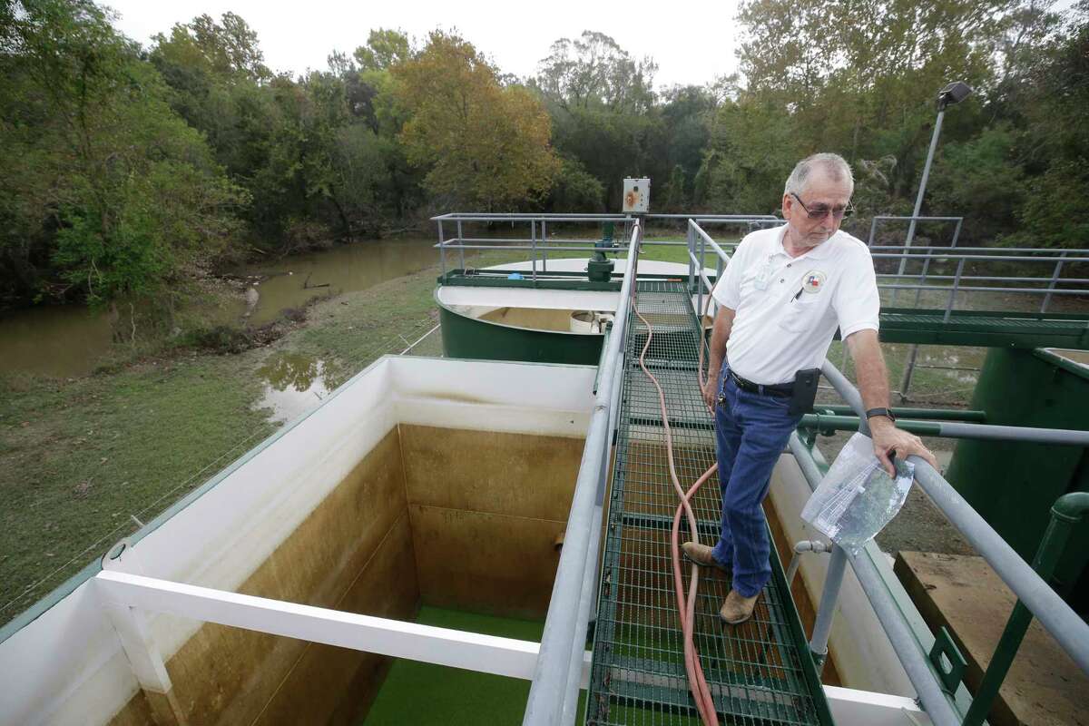 Larry Gray talks about sewage treatment plant at the Bear Creek Pioneers Park, 3535 War Memorial Drive, that was flooded during Hurricane Harvey.