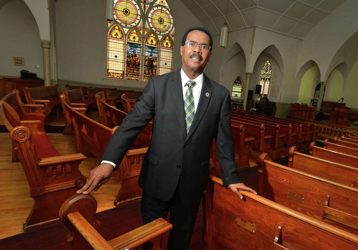 Pastor Pierre Vincent in the sanctuary of The Mount of Olives Haitian Seventh-day Adventist Church, expanding into the former East Avenue United Methodist Church in Norwalk on Sunday, Nov. 5.