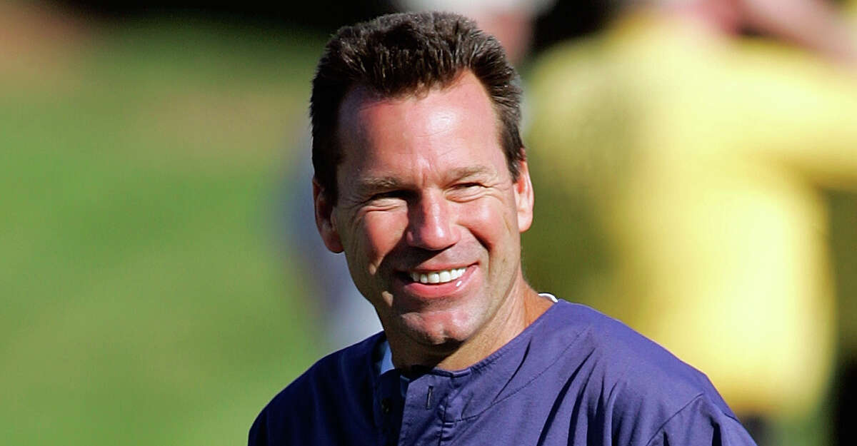 Denver Broncos offensive coordinator Gary Kubiak laughs during training camp at Broncos headquarters in Denver, in a Saturday, July 30, 2005 photo. Kubiak is being courted by the Houston Texans to fill their vacant head coaching position. (AP Photo/Jack Dempsey, file)