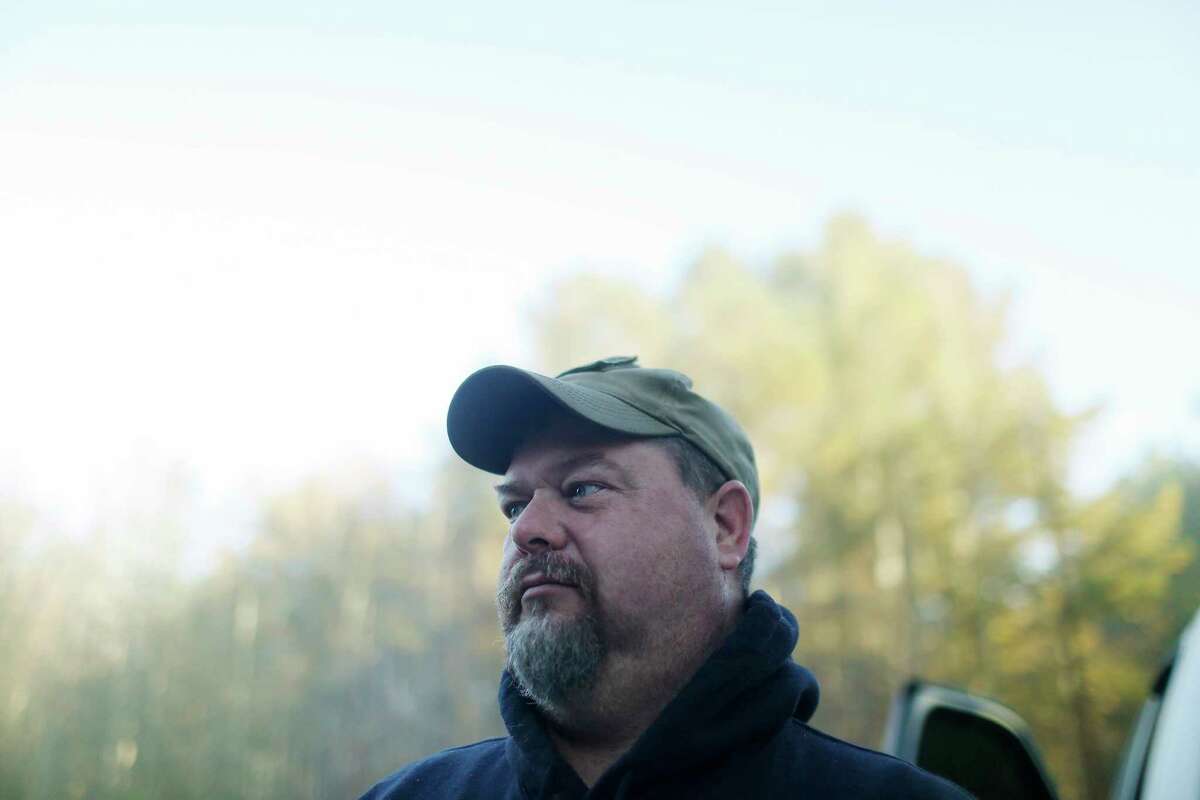 Chris Hopper, 45, Altoona, Ala., talks with the Associated Press about Alabama Senator candidate Roy Moore, Friday, Nov. 10, 2017, in Altoona, Ala. Hopper, a neighbor of Moore, says, "why not vote for somebody that's got good Christian values. The world is going to hell in a hand basket, I was raised Southern Baptist and the way things are going now a days its just terrible, the allegations with Roy, its mud slinging at its best." (AP Photo/Brynn Anderson)