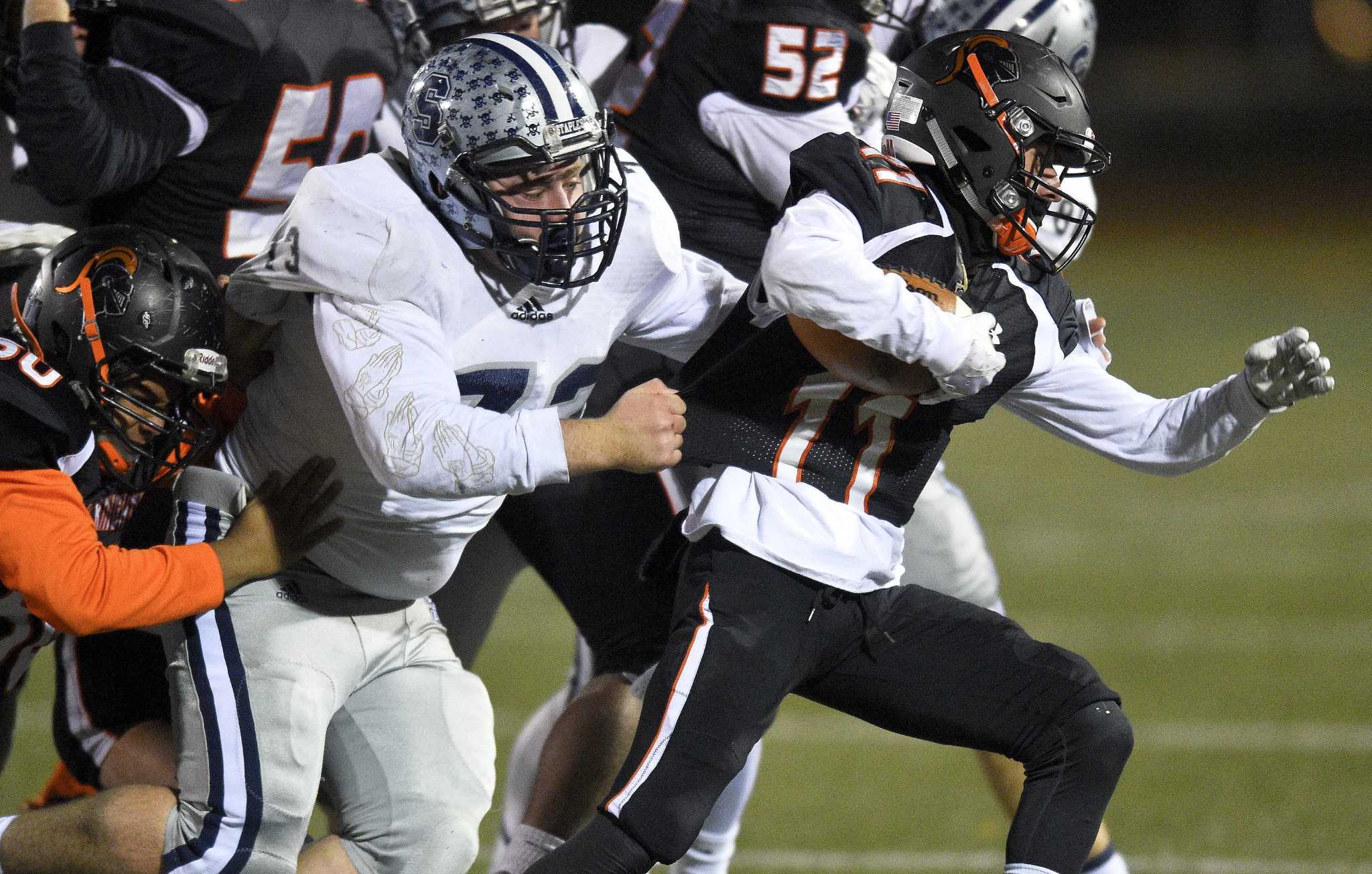 Staples football rolls over Stamford Westport News