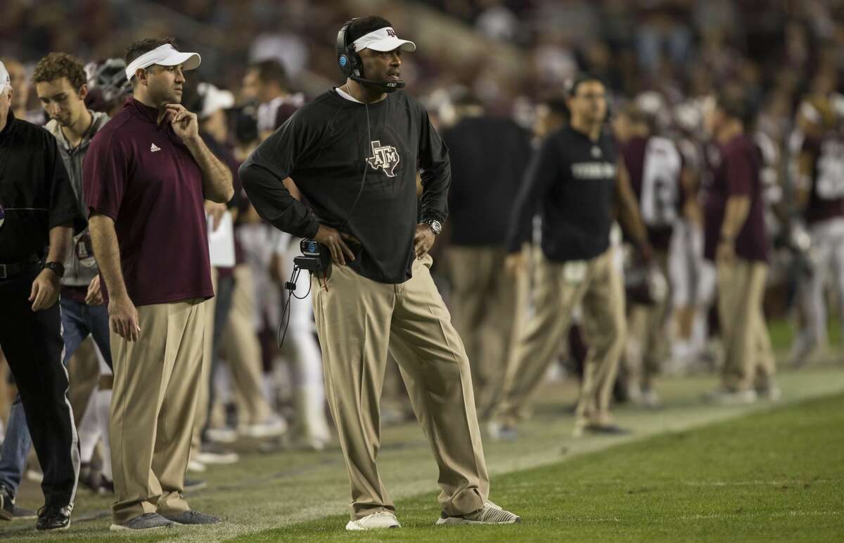 Texas A&M head coach Kevin Sumlin looks towards his team before a play during the second quarter of an NCAA college football game against New Mexico on Saturday, Nov. 11, 2017, in College Station, Texas. (AP Photo/Sam Craft)