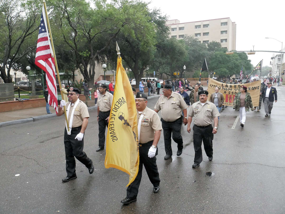 Representatives of the Laredo Veterans Color Guard lead the marching veterans at the annual Veterans Day Parade, Saturday, November 11, 2017.