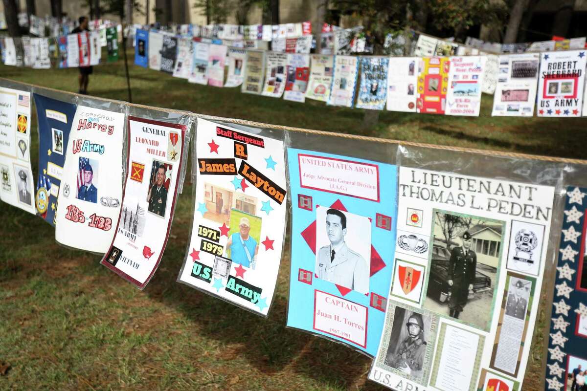 About 1,200 posters celebrating veterans were created by eighth graders and hung outside of McCullough Junior High on Friday, Nov. 10, 2017, in The Woodlands.