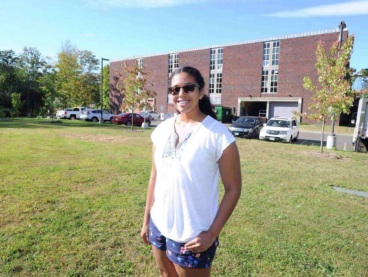 Greenwich High School senior Rene Jameson, 17, stands at the site of her proposed garden at the school in Greenwich, Conn., Thursday, Sept. 28, 2017. Jameson says she has approval from the school to start her community garden but that the town has yet to sign-off on the project.