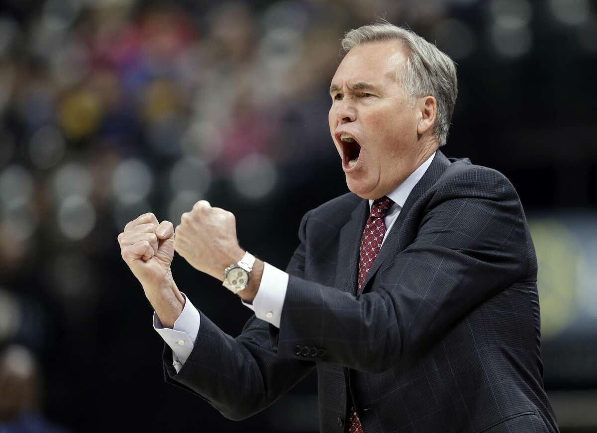 Houston Rockets head coach Mike D'Antoni argues a call during the first half of an NBA basketball game against the Indiana Pacers, Sunday, Nov. 12, 2017, in Indianapolis. (AP Photo/Darron Cummings)