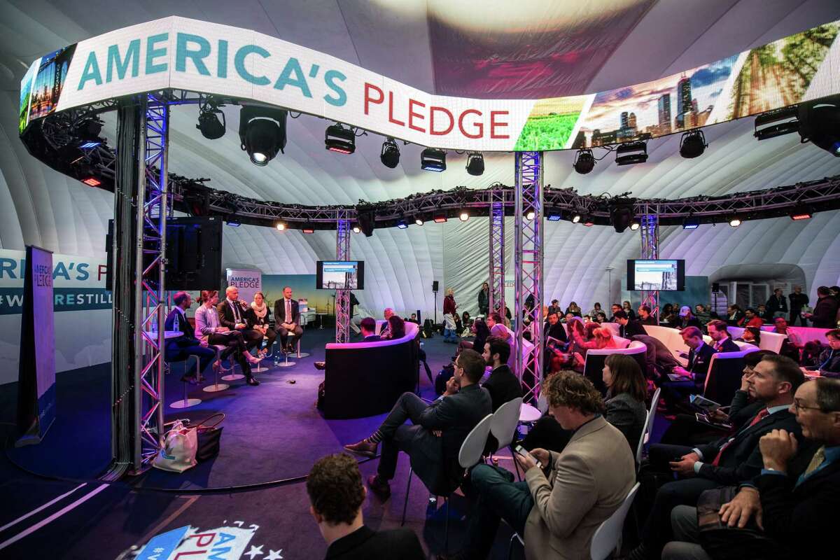General view of the U.S. "We Are Still In" pavilion at the COP 23 United Nations Climate Change Conference on November 11, 2017 in Bonn, Germany. A delegation of U.S. business, state and city government presented United Nations Framework Convention on Climate Change (UNFCCC) Executive Secretary Patricia Espinosa with the America's Pledge report detailing the efforts of U.S. states, cities and businesses to keep America on line in fulfilling goals towards carbon reduction set out by the Paris Climate Agreement. The "We Are Still In" initiative is an alliance of U.S. state and city government representatives, business interests and climate activists who want the U.S. To remain a signatory of the Paris Climate Agreement. U.S. President Donald Trump has announced that the U.S. is withdrawing from the Paris Agreement and the White House is sending its own delegation of fossil fuel supporters to the COP 23 conference next week to make the case for the continued role of coal and petroleum in world energy needs. 