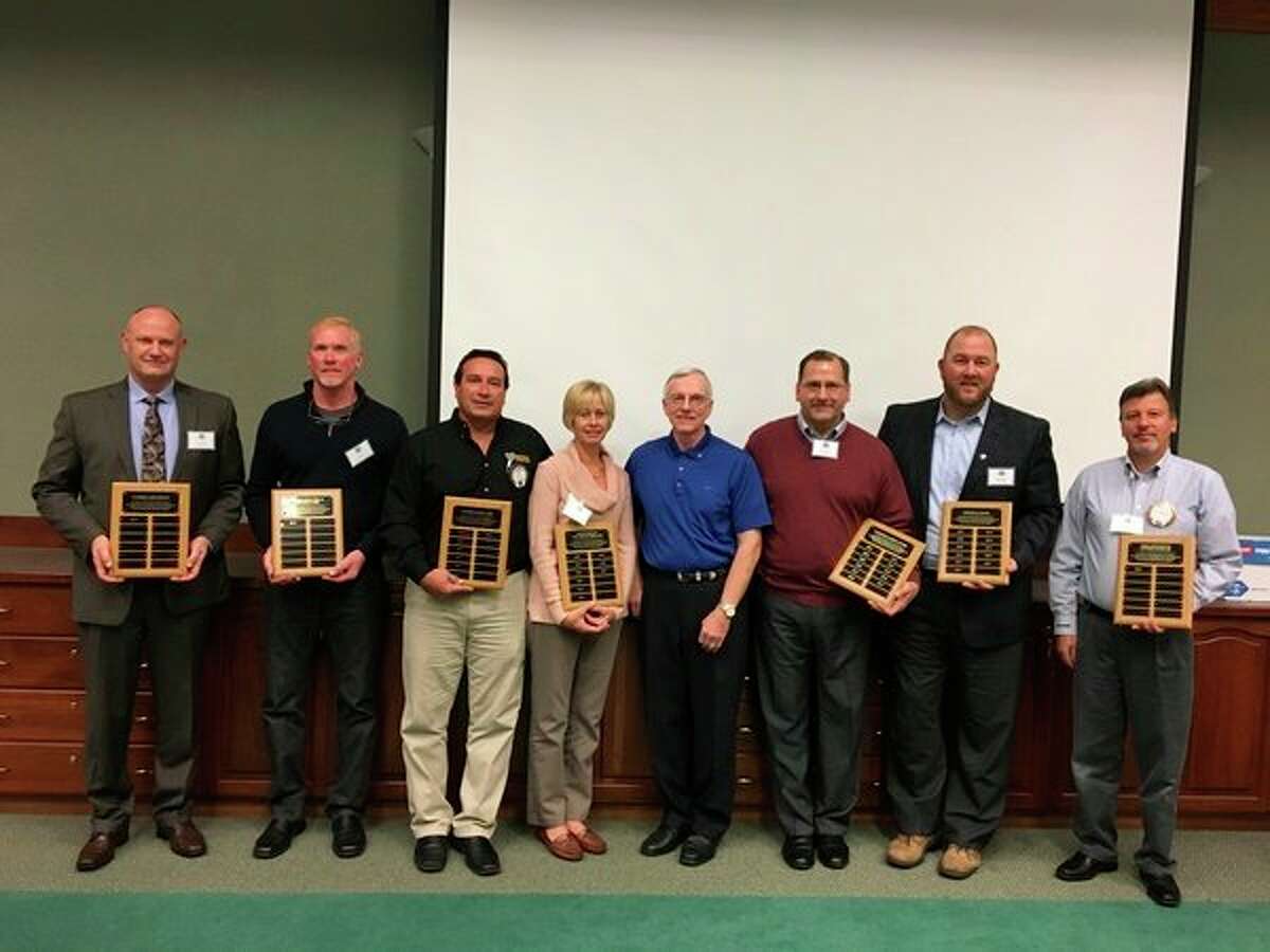 Gold Award Sponsorship plaque recipients pictured are, from left, Craig Lang, Garber Chevrolet; Jay Brown, Valley Electrical Contractors; Gary Vogel, Bayside Home Care; Kathy Schmitt, Independence Village of Midland; Doug Snoddy, Kiwassee Kiwanis president; Gar Winslow, Eastman Party Store; Mike Williams, Chemical Bank; and Alex Rapanos, Midland Towne Center Storage. Gold Award Sponsorship recipients not pictured are Patti and Dave Kepler.