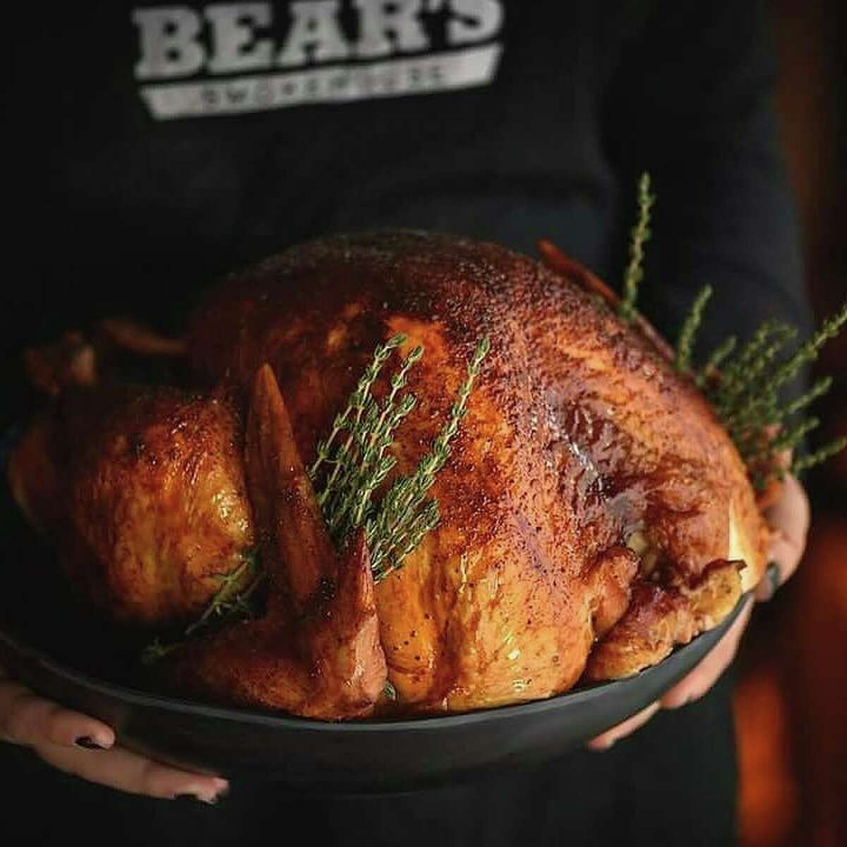 Bear's Smokehouse has a Thanksgiving take-out menu with extensive options for meats, salads, sides, stuffings and breads, sauces and gravies, and desserts.