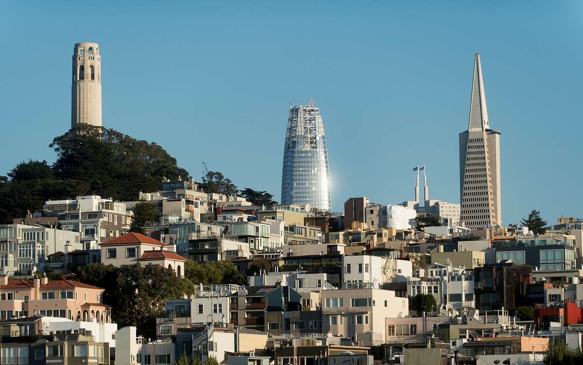Flanked by Coit Tower and the Transamerica Pyramid, the Salesforce tower rises above San Francisco on Saturday, Aug. 26, 2017.