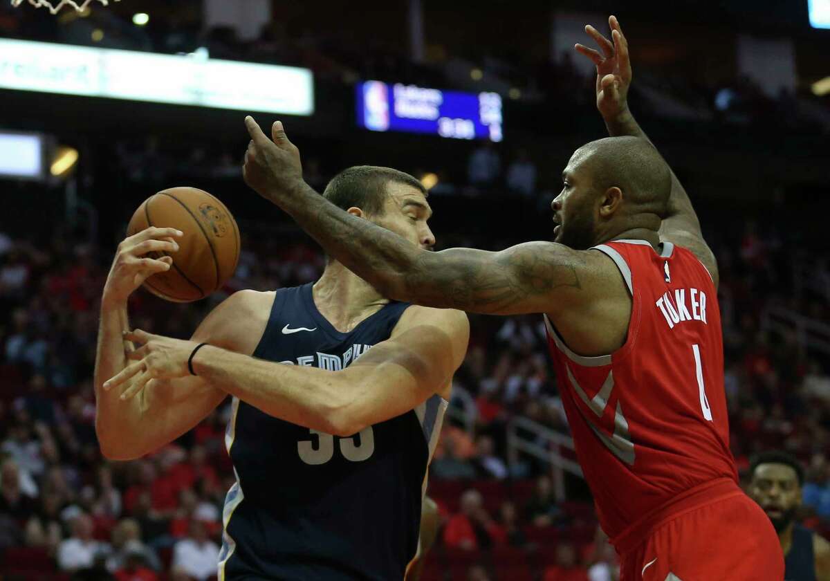 Houston Rockets forward PJ Tucker (4) gets the rebound ball away from Memphis Grizzlies center Marc Gasol (33) during the second quarter of an NBA game at Toyota Center on Saturday, Nov. 11, 2017, in Houston. ( Yi-Chin Lee / Houston Chronicle )