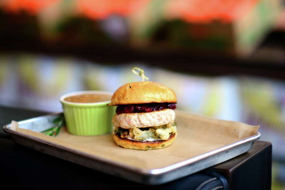 Hopdoddy Burger Bar Offers A Thanksgiving Inspired Turducken Burger With Fried Green Beans And Cranberry Hopdoddy Burger Bar Offers A Thanksgiving Inspired Turducken Burger With Fried Green Beans And Cranberry