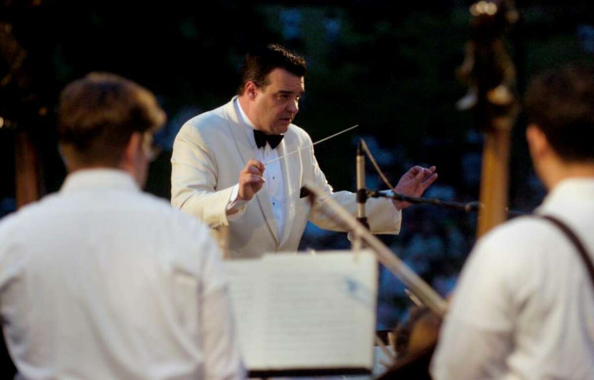 Matthew Savery of Bozeman, Mont., conducts the 15th annual Greater Bridgeport Symphony pops concert at Fairfield University on Saturday, June 26, 2010.
