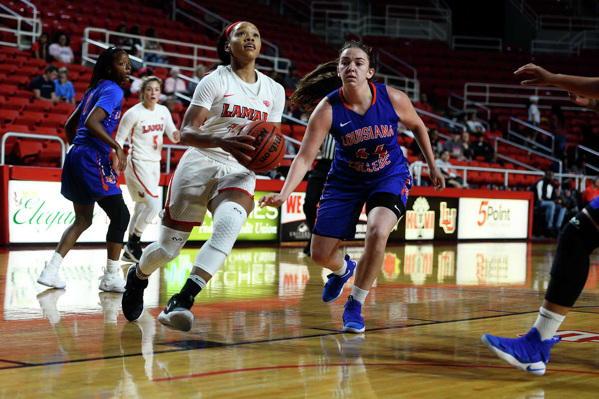 Lamar's Chastadie Barrs drives the lane against Louisiana College during the women's basketball team's season opener at the Montagne Center on Monday night. The Lady Cardinals went undefeated at home last season. Photo taken Monday 11/13/17 Ryan Pelham/The Enterprise