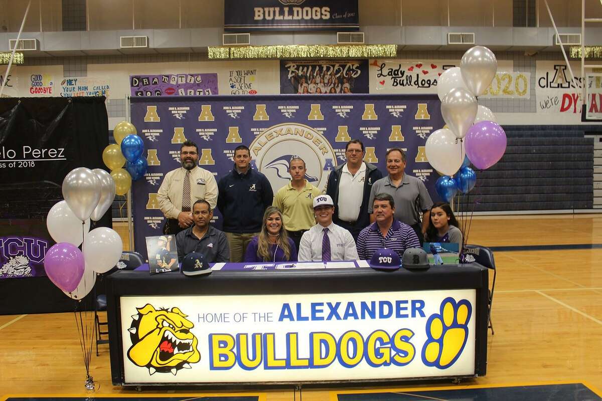 Marcelo Perez committed to TCU Monday. He is joined in the front row by Freddy Benavides, his parents Zulma and Osiel and his sister Maria Fernanda. In the back row are Alexander principal Ernesto Sandoval, assistant coach Jose Govea, head coach Fernando Lemus and assistant coaches Richard Alaniz and Armando Gamez.