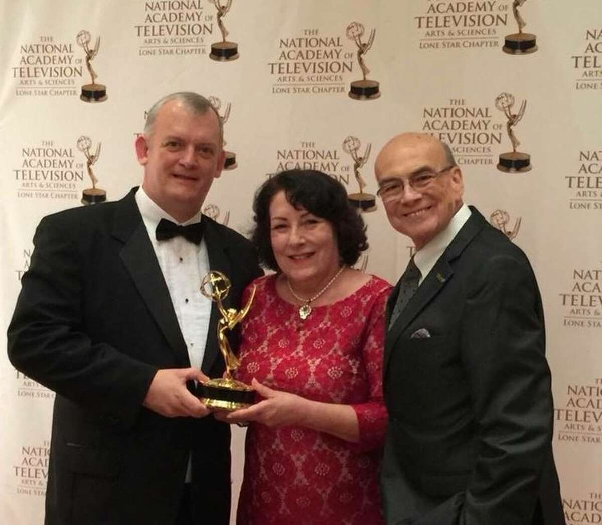 ‘Rhapsody on the Rio Grande” has been awarded the Lone Star Chapter Regional Emmy in the “Documentary-Topical” Category, from among eight nominees. Left to right are Texas A&M International University’s Dr. Colin Campbell, composer for the documentary’s score; Rosanne Palacios, TAMIU vice president for Institutional Advancement, and Arthur Emerson, president and CEO of KLRN which produced the film, in partnership with TAMIU, along with generous funding from the City of Laredo. 