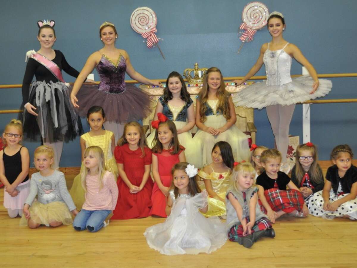 Backstage Dance Studio will host performances of "The Nutcracker" Dec. 2 at 2 p.m. and 5:30 p.m. at the Conroe High School Auditorium. Pictured are the Sugar Plum Fairy - Abbey Fleming; Clara at 2 p.m. performance - Tori Scholl; Clara at 5:30 performance - Bella Tessman; Snow Queen - Emily Cook and on floor - Rat Queen - Avery Waller. They are pictured at a Nutcracker Holiday Party held on Nov. 11.