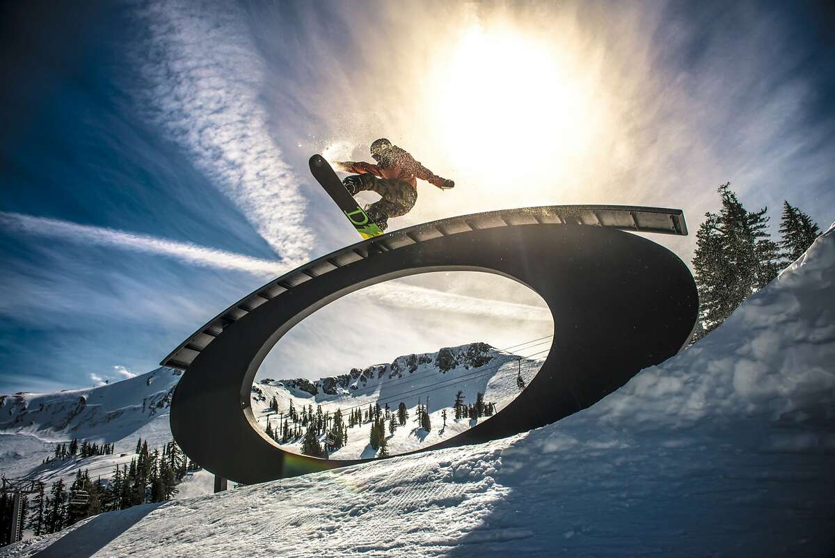A snowboarder catches some air at one of six terrain parks at Squaw Valley Alpine Meadows. (Matt Palmer/Squaw Valley Alpine Meadows)