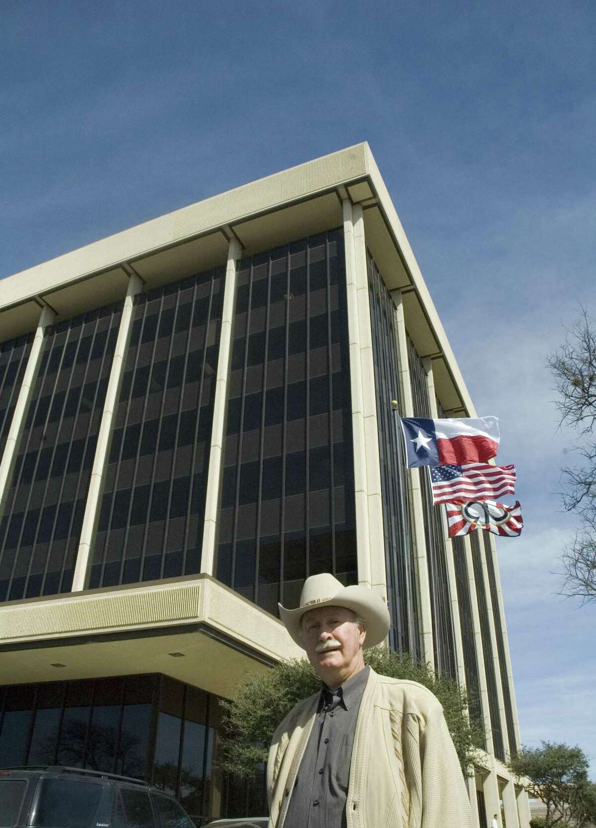 Real estate investor James F. Cotter is shown in 2007 after he bought Alamo Towers. Court-appointed administrator Marcus Roger says he saved the towers from foreclosure by putting them into bankruptcy.