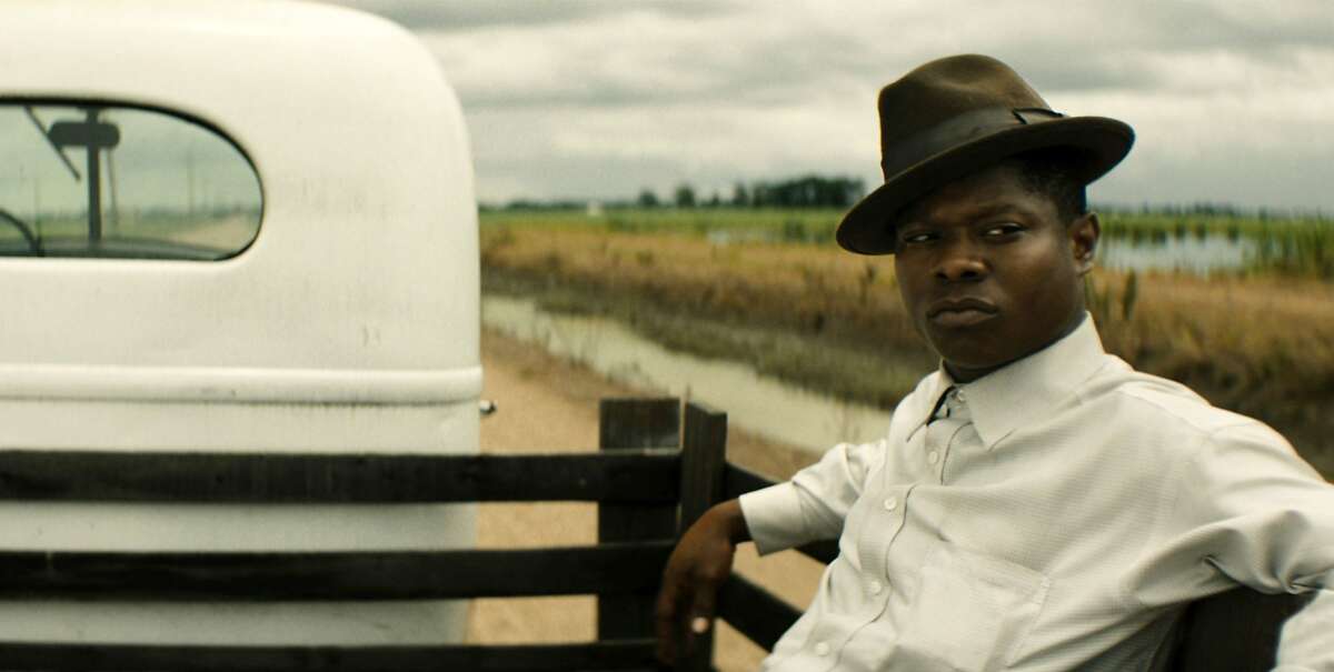 This image released by Netflix shows Jason Mitchell in a scene from "Mudbound." (Netflix via AP)