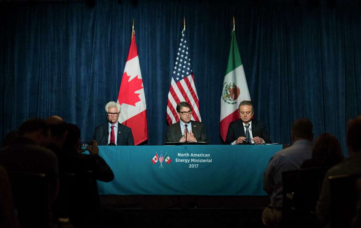 (Left to right) Minister of Natural Resources Jim Carr of Canada, U.S. Department of Energy Secretary Rick Perry and Secretary of Energy P. Joaquin Coldwell of Mexico gather during the North American Energy Ministerial to answer questions for the press, Tuesday, Nov. 14, 2017, in Houston. ( Marie D. De Jesus / Houston Chronicle )