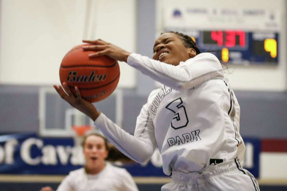 College Park's Alexus Murphy (5) rebounds the ball during the varsity girls basketball game against Cy-Falls on Tuesday, Nov. 14, 2017, at College Park High School. (Michael Minasi / Houston Chronicle)