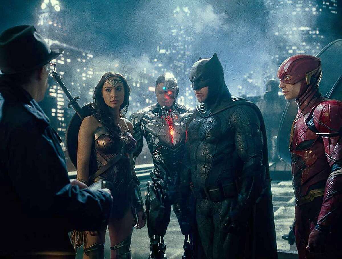 Wonder Woman (Gal Gadot), Cyborg (Ray Fisher), Batman (Ben Affleck) and the Flash (Ezra Miller) meet with Commissioner Gordon (J.K. Simmons) in "Justice League." MUST CREDIT: Warner Bros.-DC Entertainment