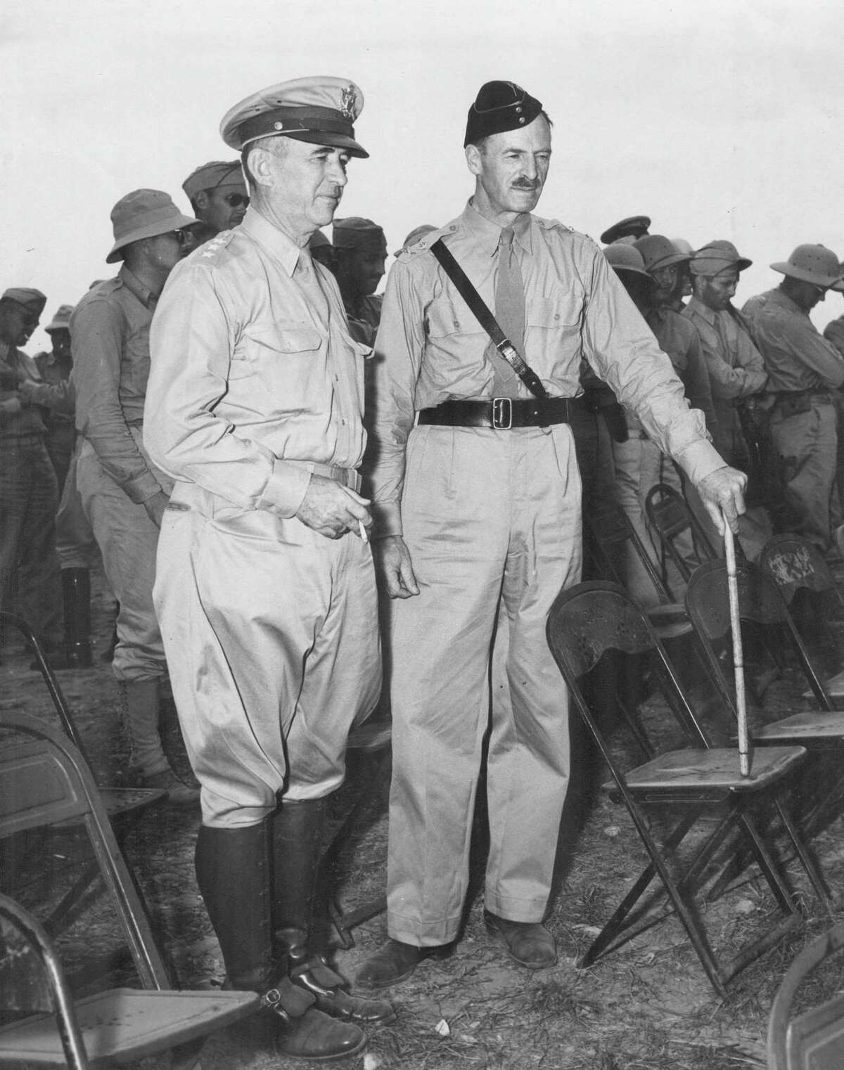 Witnessing a field exercise in the 1940s by the 2nd Infantry Division at Camp Bullis are Lt. Gen. Walter Krueger, commanding general of the Third Army; and Maj. Gen. Richard Henry Dewing of the British Military Staff in Washington, D.C. The exercise included a tank-led demonstration of an attack upon a strongly-held defensive position.